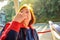 Portrait photo of senior asian women Smell her hand and Look up on the Tourist bus