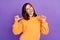 Portrait photo of young pretty adorable pretty lady wear orange shirt toothy smile fingers point herself personal