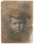 Portrait photograph of a little boy in his cap with the inscription Baltic Fleet.