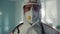 Portrait physician protective suit posing in hospital infectious department.
