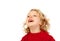 Portrait of playful small kid with long blond hair looking up