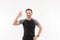 Portrait of pleased adult man fitness instructor smiling and gesturing ok sign after practising, isolated over white background