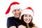 Portrait of pleased couple with christmas hat