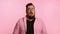 Portrait of a plump man on a pink background, black friday, sale