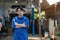 portrait of positive asian auto mechanic in uniform posing after work, he is keen on repairing cars, automobiles