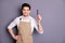 Portrait of positive cheerful hairdresser man hold comb ready make stylish hairdo wear white shirt  over grey