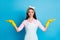 Portrait of positive cleaner girl hold hand present adverts promotion option object wear pink shirt headband yellow