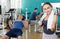 Portrait of positive sporty girl in gym