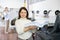 Portrait of positive woman printing office worker