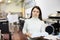 Portrait of positive woman printing office worker