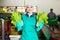 Portrait of positive woman vegetable factory worker with lettuce