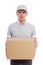 Portrait of postman or delivery man in uniform with box isolated on white