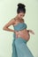 Portrait of Pregnant Asian Indian tanned skin woman fabric fluttering in Air