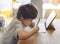 Portrait of preschool kid using tablet for his homework,Soft focus of Child doing homework by using digital taplet searching