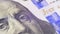 Portrait of President Benjamin Franklin on a Hundred Dollar bill Rotate
