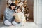 Portrait of pretty girl and beautiful female mother sit together