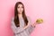 Portrait of pretty lady arm palm showing reject gesture hold burger isolated on pink color background