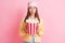 Portrait of pretty lady hands holding popcorn unexpected scary moment headwear cap isolated on pink color background