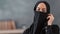 Portrait of pretty Muslim woman covering niqab face apart from eyes. Shot with RED camera in 4K