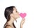 Portrait of pretty woman in love kissing heart