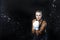 Portrait of Professional Active Female Boxer  Posing with White Gloves in Aqua Studio Against Black Background