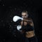 Portrait of Professional Active Female Boxer  Posing with White Gloves in Aqua Studio Against Black Background