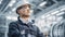 Portrait of a Professional Asian Heavy Industry Engineer/Worker Wearing Safety Uniform, Glasses and