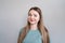 Portrait professional beautician smiling young woman in green uniform