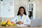 Portrait of professional black dietitian smiling at camera in weight loss clinic. Smart eating concept