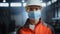 Portrait of a Professional Heavy Industry Engineer Worker Wearing on Safety Face Mask in a Steel F