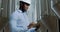 Portrait of a professional industrial engineer. Technician engineer in a safety helmet with a tablet. Large industrial