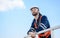 Portrait of professional maintenance engineer working at wind turbine farm