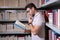 Portrait of professor with book in classroom. Handsome professor in library. Teachers Day. Good professor. Man professor