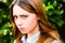 Portrait of red-haired girl close-up.