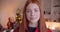 Portrait of red-haired happy teenage girl Christmas New Year smiling happy