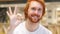Portrait of Redhead Beard Man Gesturing Okay Sign in Cafe