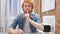 Portrait of Redhead Beard Man Gesturing Silence, Finger on Lips, Indoor