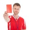 Portrait of referee showing red card