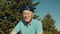 Portrait of retired male cyclist wearing bike helmet looking with cheerful smile