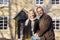 Portrait Of Retired Senior Couple Standing Outside Home Together