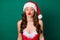 Portrait of romantic flirty gorgeous stunning chic lady in santa claus hat send air kiss on x-max jolly holly newyear