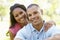 Portrait Of Romantic Young African American Couple In Park