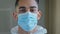 Portrait sad male face tired ethnic arabic hispanic doctor man medical worker surgeon specialist wear protective mask