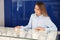 Portrait of saleswoman near showcase in jewelry store