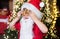 Portrait of Santa Claus Drinking milk from glass and holding cookies. Christmas Beard style. Merry Christmas. Santa boy