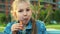 Portrait of a schoolgirl eating