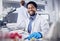 Portrait, scientist or black man with research in laboratory, tablet or innovation for healthcare, online schedule or