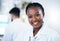 Portrait, scientist and smile of black woman in laboratory ready for medical healthcare. Science, innovation and face of