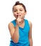Portrait, secret and children with a boy standing finger on lips in studio isolated on a white background. Kids, whisper