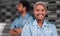 Portrait, security or safety and a happy black woman in the city with a man colleague on the street. Law enforcement